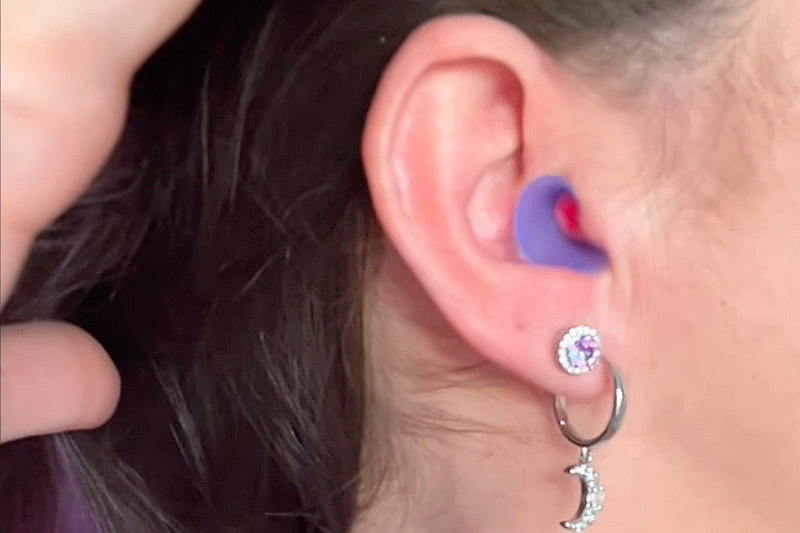Customer using Manta Sleep Earplugs